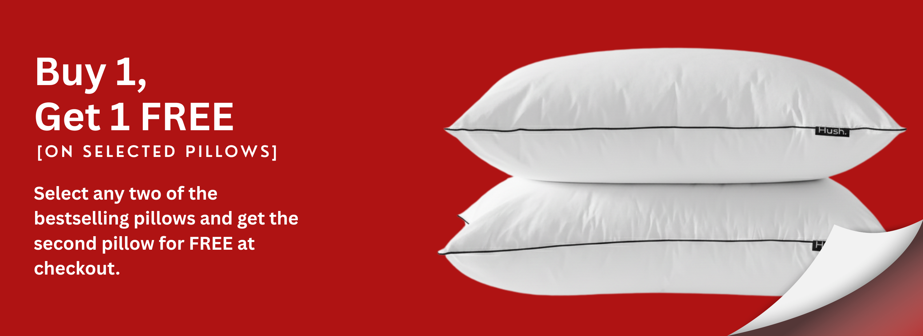 Two white pillows on a red background with promotional text for buying one, getting one free offer.